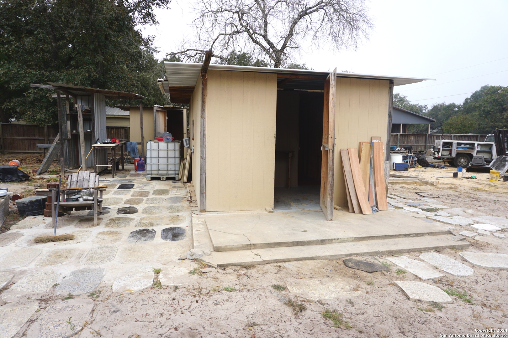 47 Viewpoint Drive Poteet, TX 78065 - Photo 12 of 20 a view of a house with a patio