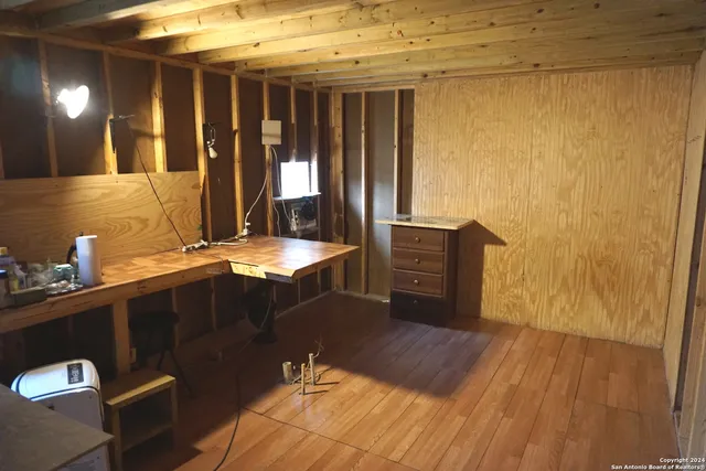 a bathroom with a sink vanity and a mirror