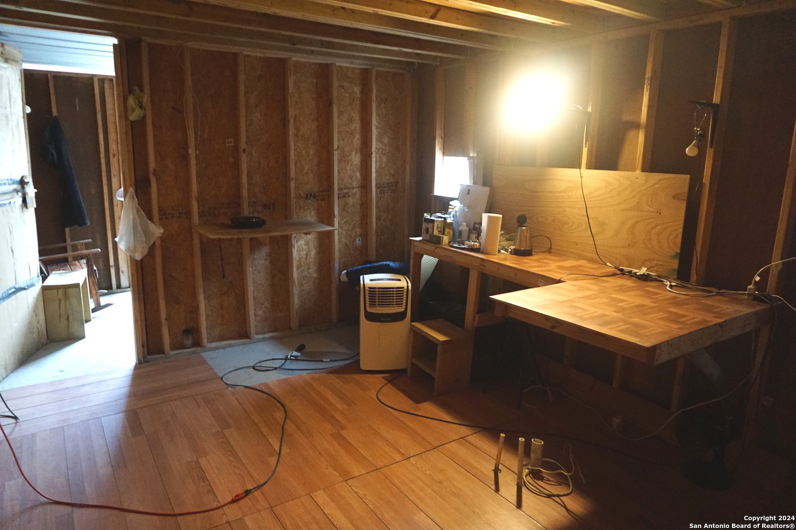 47 Viewpoint Drive Poteet, TX 78065 - Photo 18 of 20 a bed sitting in a room next to a window