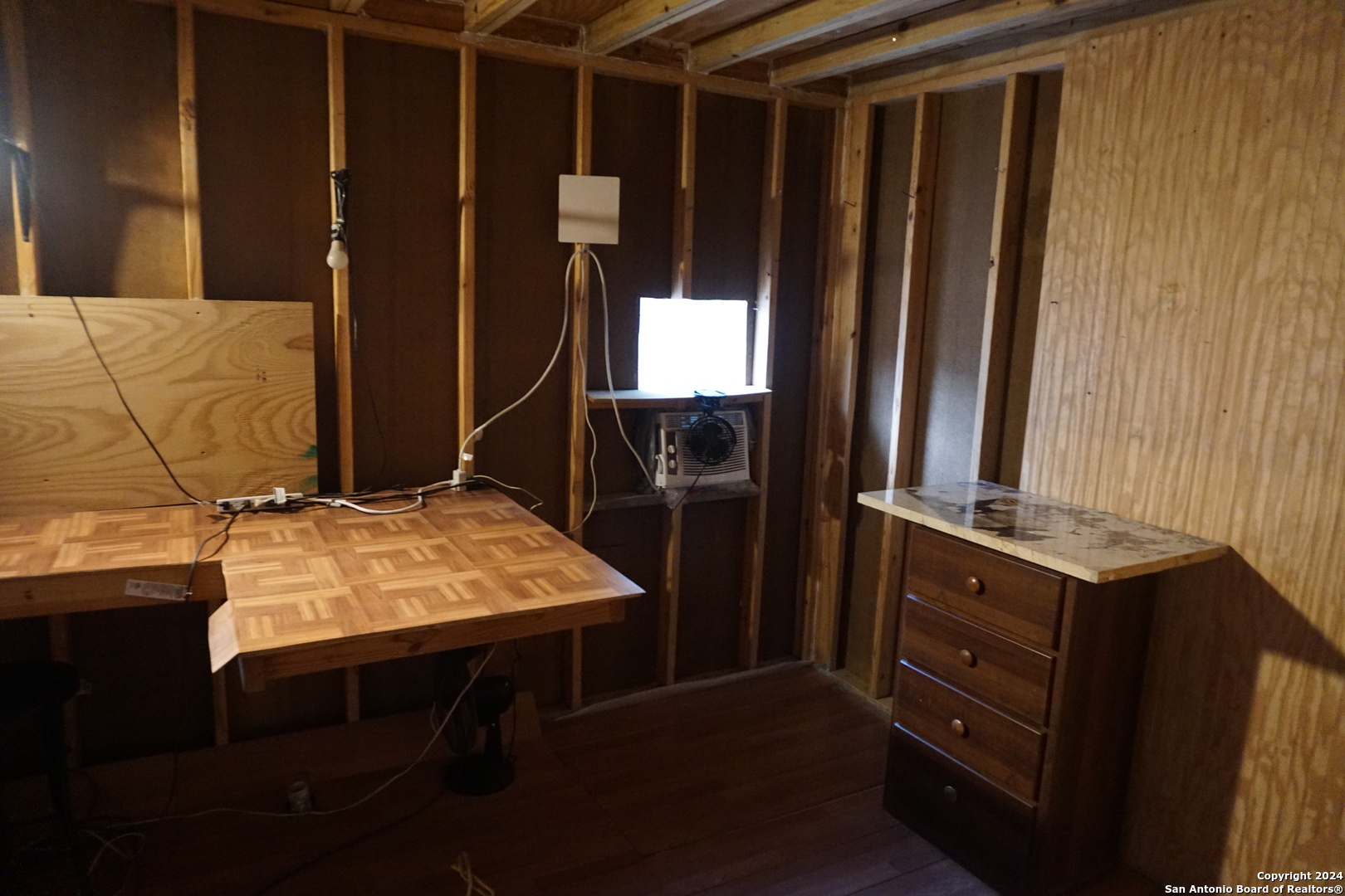 47 Viewpoint Drive Poteet, TX 78065 - Photo 19 of 20 a bed sitting in a kitchen next to a window