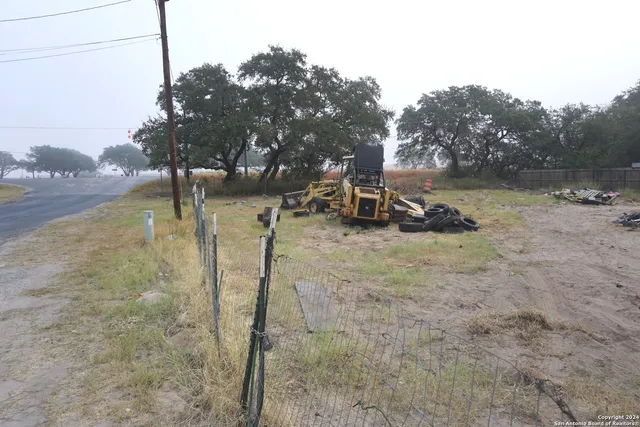 a view of a yard with a slide