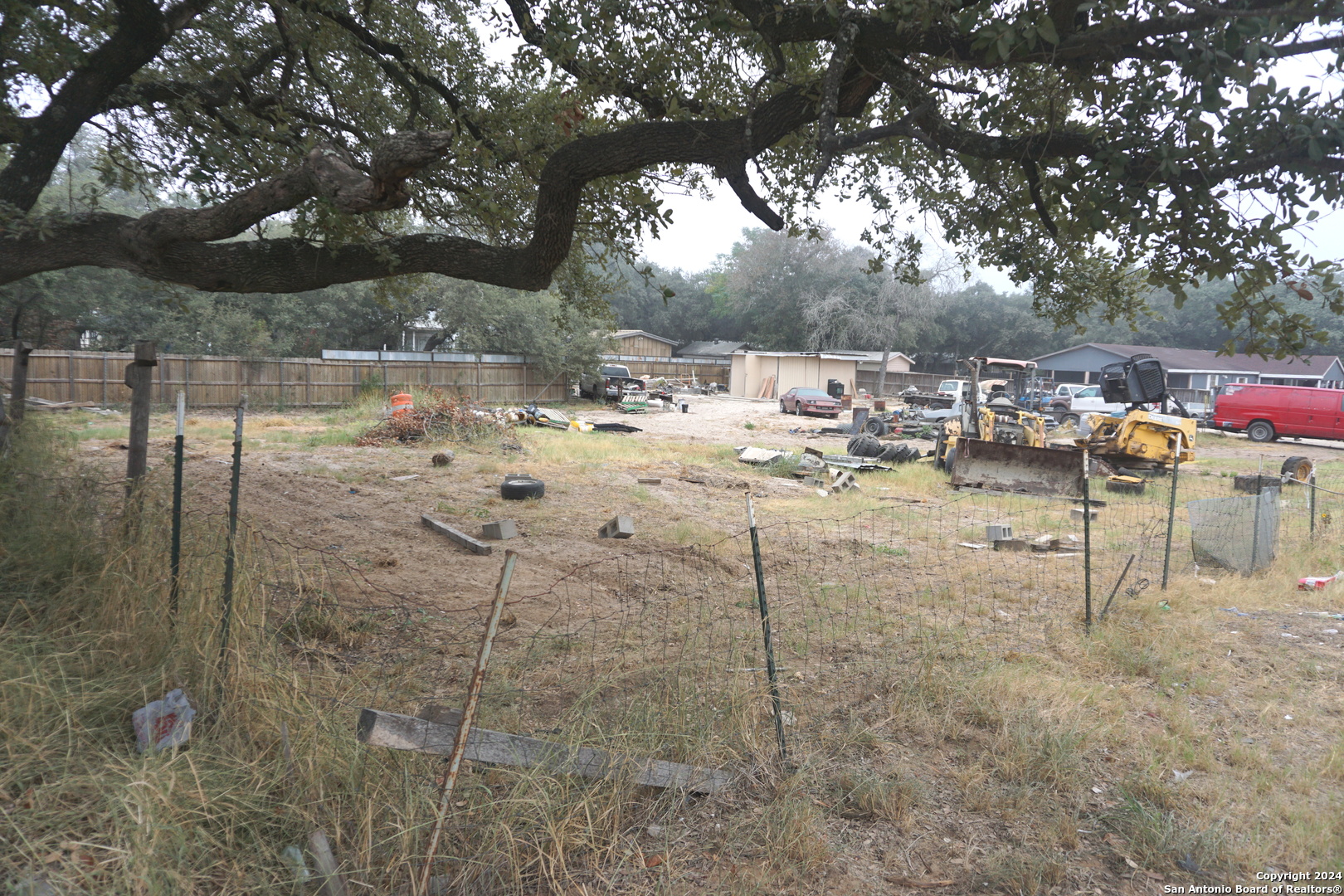 47 Viewpoint Drive Poteet, TX 78065 - Photo 4 of 20 a view of a yard with table and chairs