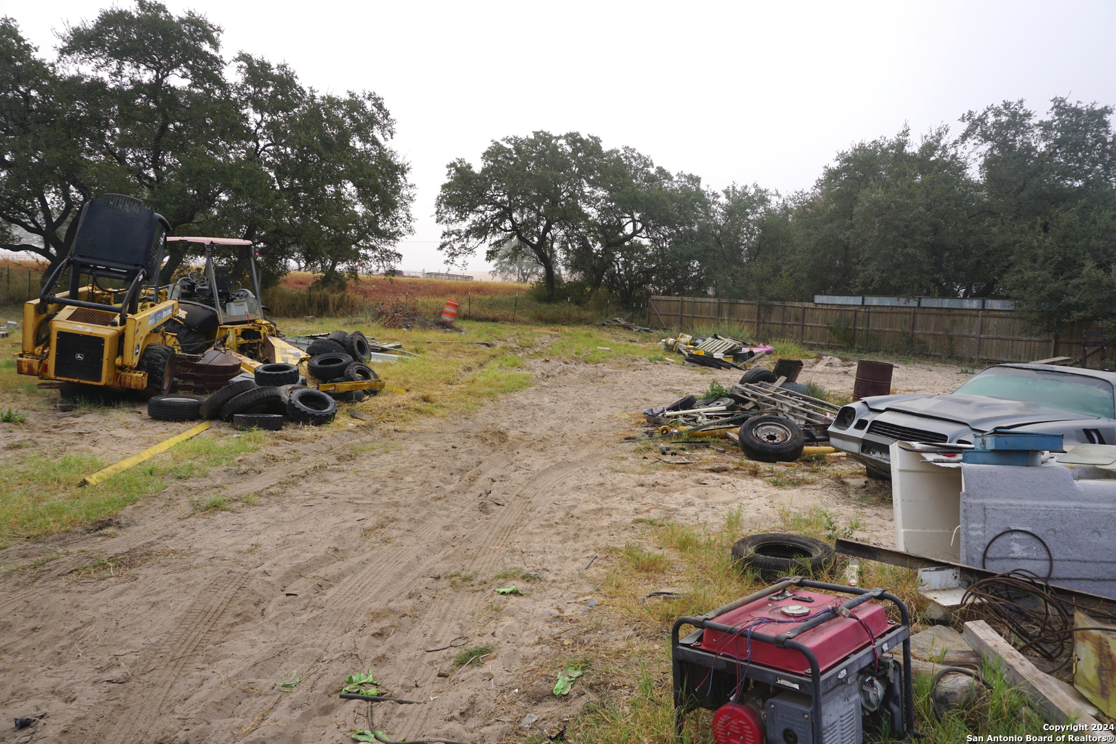 47 Viewpoint Drive Poteet, TX 78065 - Photo 9 of 20 a view of a lake with a car parked