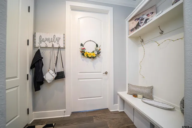 a bathroom with a sink and mirror