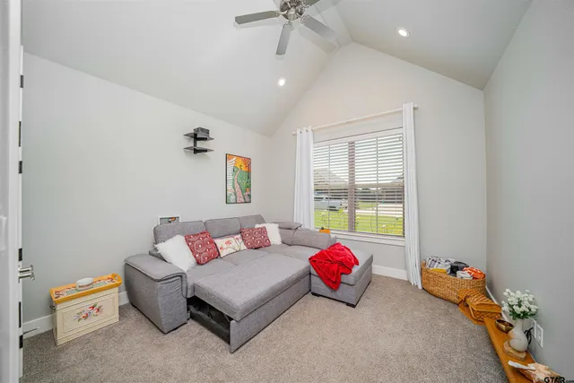 a backyard of a house with outdoor seating