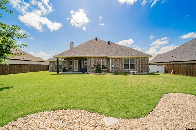 a house view with a outdoor space