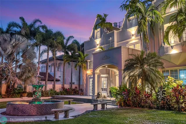 a swimming pool with outdoor seating and yard
