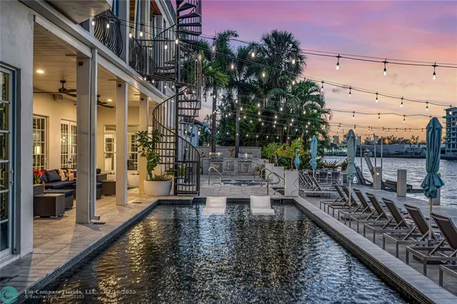 a view of a balcony with chairs