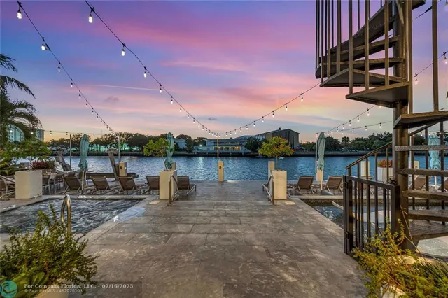 a view of a lake with sitting area
