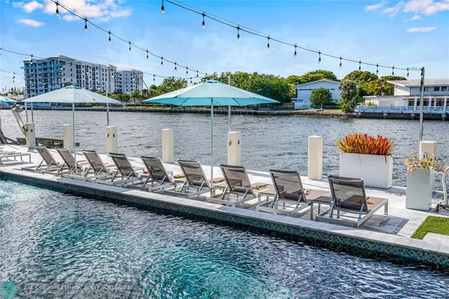 a view of a lake with sitting area