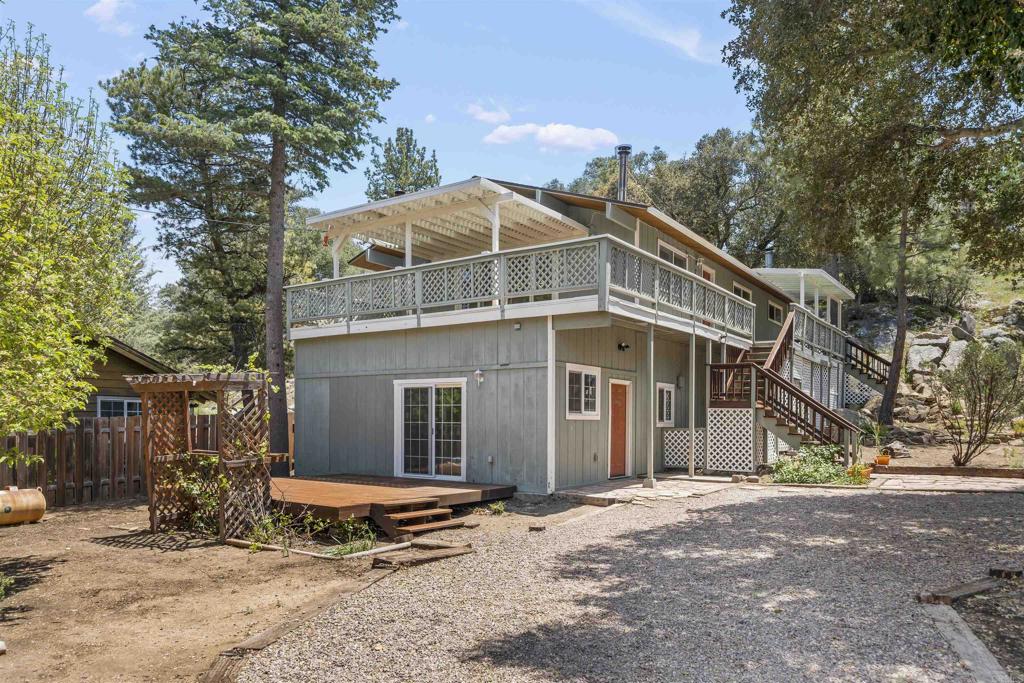 29131 Half Moon Trail Pine Valley, CA 91962 - Photo 1 of 50 a front view of a house with a yard
