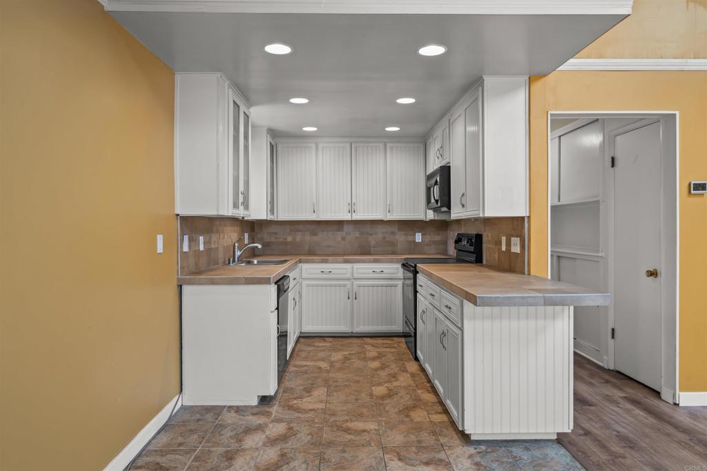 29131 Half Moon Trail Pine Valley, CA 91962 - Photo 17 of 50 a kitchen with a sink stove and cabinets