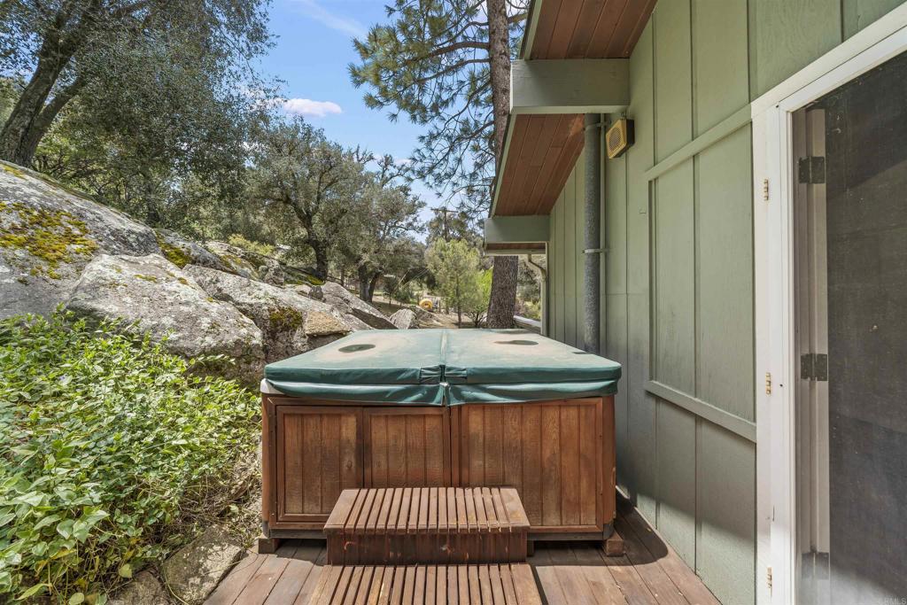 29131 Half Moon Trail Pine Valley, CA 91962 - Photo 29 of 50 a table and chairs in a balcony