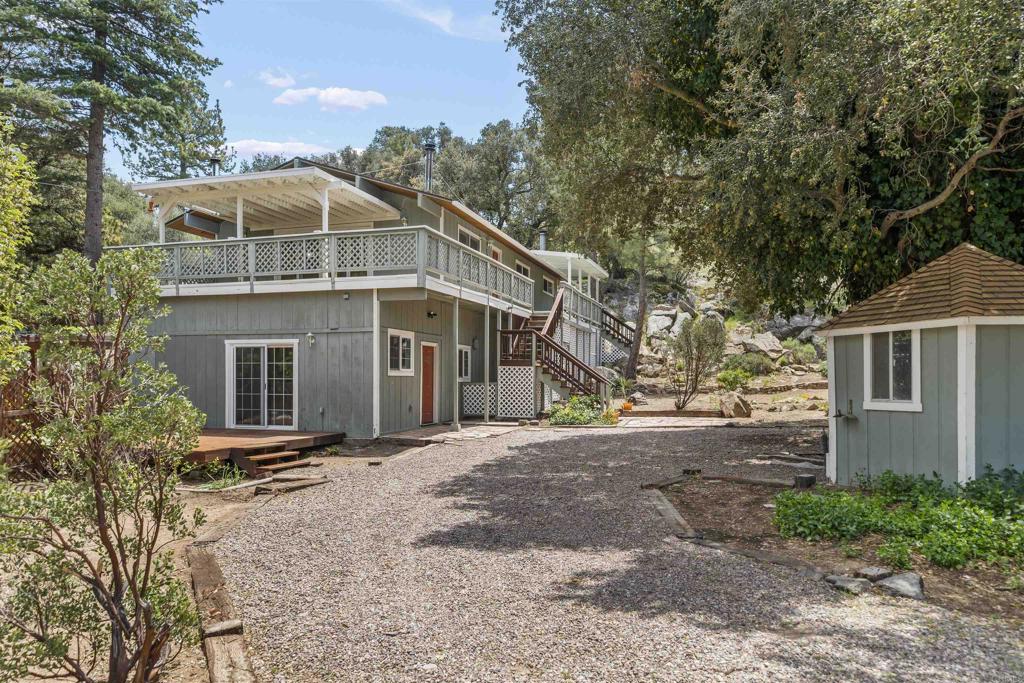 29131 Half Moon Trail Pine Valley, CA 91962 - Photo 3 of 50 a front view of house with yard and trees around