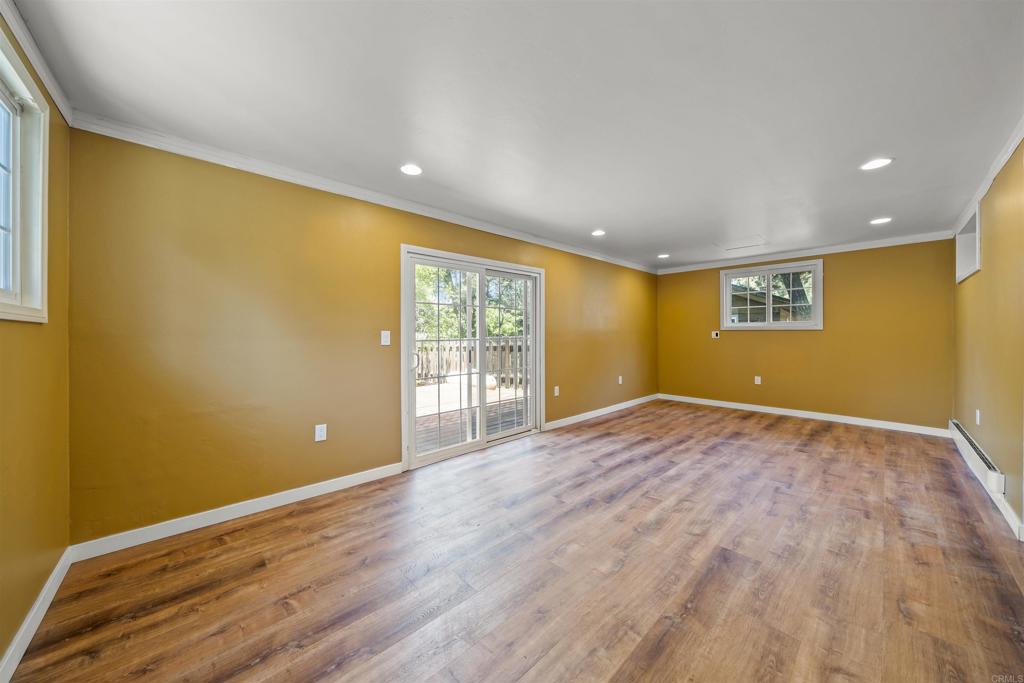 29131 Half Moon Trail Pine Valley, CA 91962 - Photo 35 of 50 a view of an empty room with wooden floor and a window