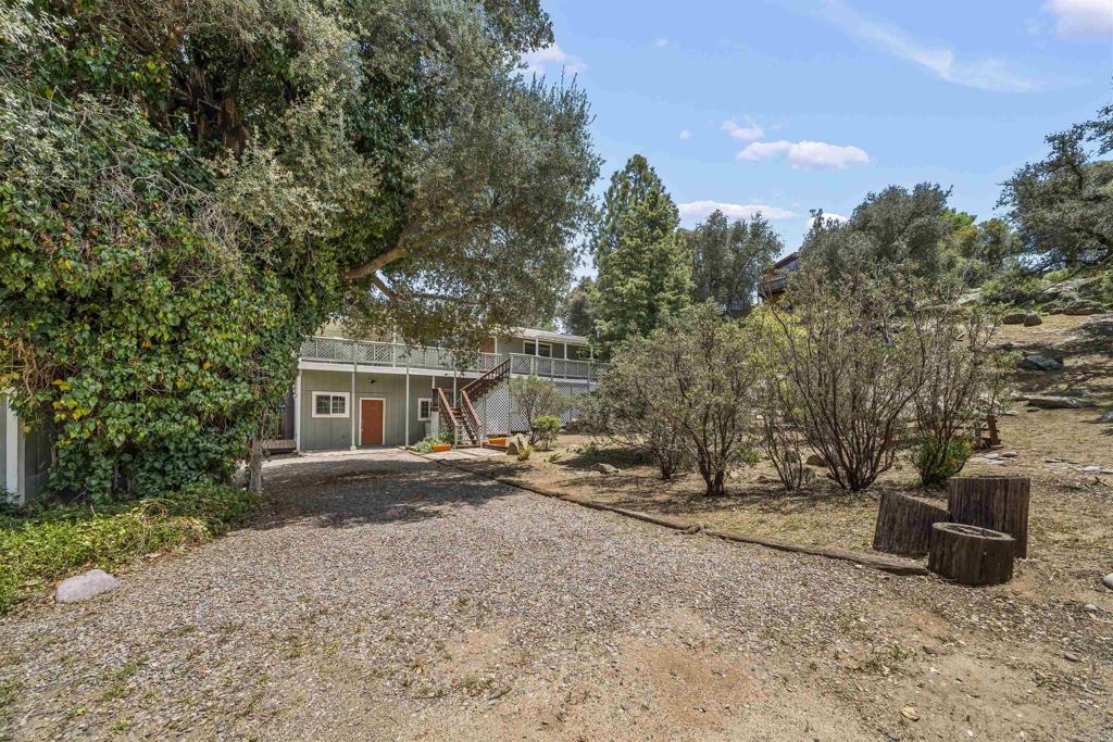29131 Half Moon Trail Pine Valley, CA 91962 - Photo 4 of 50 a view of a house with backyard and trees