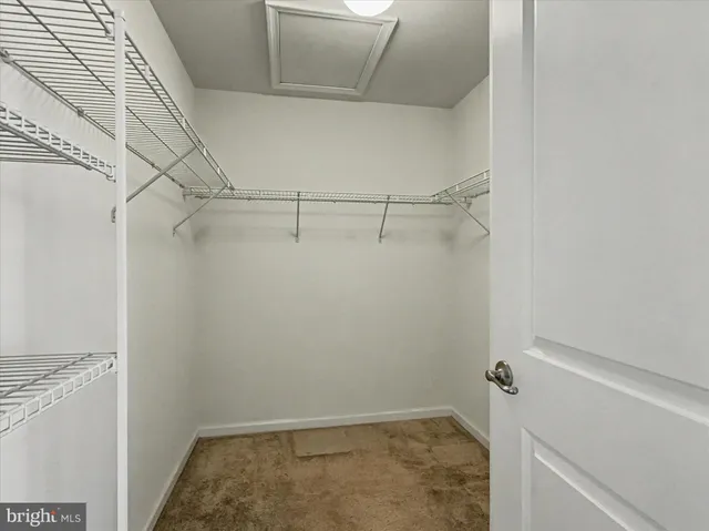 a view of a room with racks on the wall