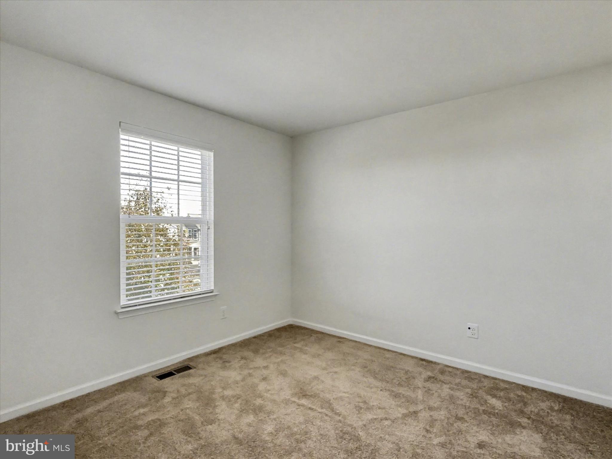 813 Countryside Road Seven Valleys, PA 17360 - Photo 22 of 38 an empty room with a window