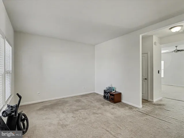 a view of empty room with a sink
