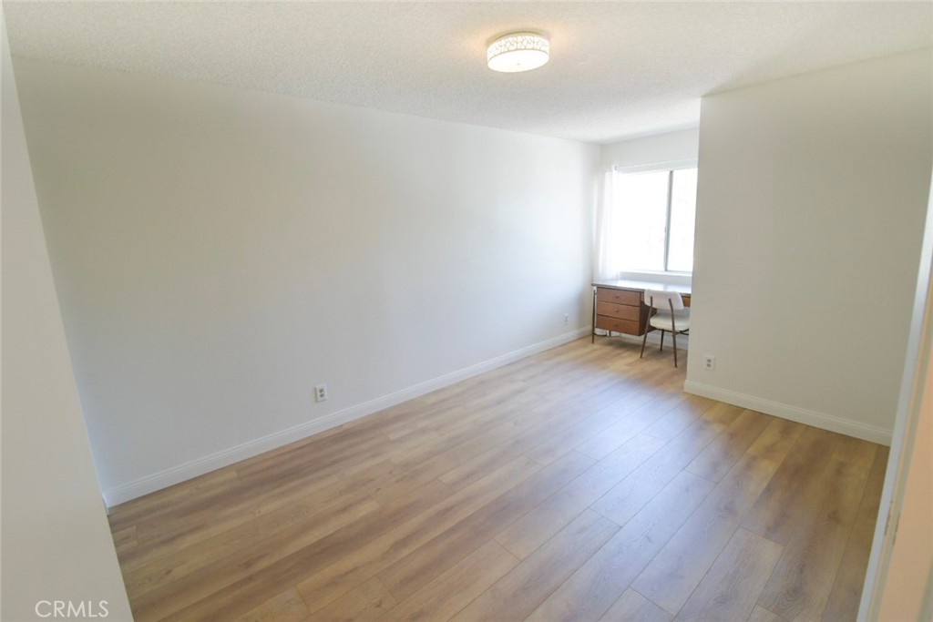 22346 Harbor Ridge Lane, Unit 4 Torrance, CA 90502 - Photo 12 of 34 a view of a room with wooden floor and a sink