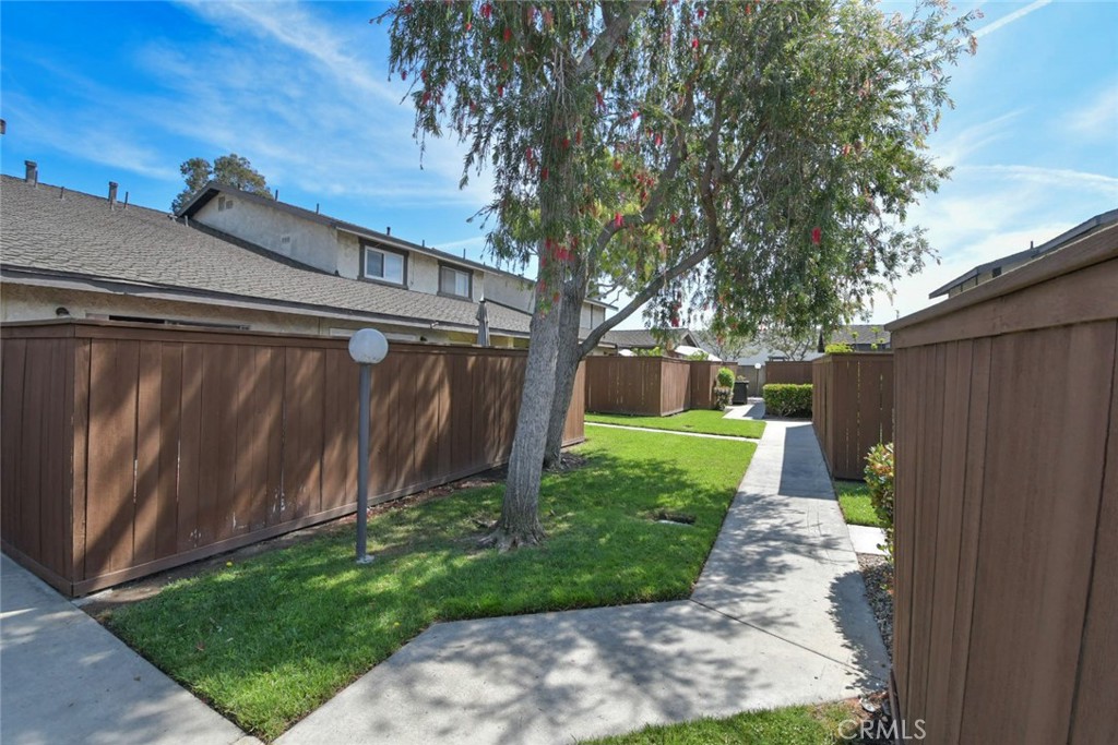 22346 Harbor Ridge Lane, Unit 4 Torrance, CA 90502 - Photo 18 of 34 a view of a back yard of the house