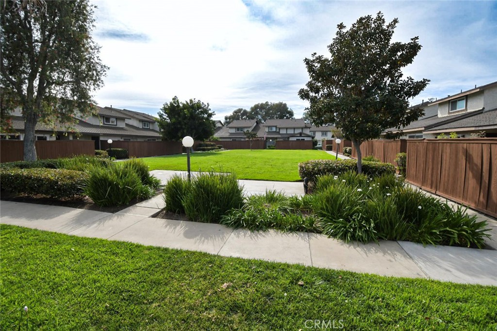 22346 Harbor Ridge Lane, Unit 4 Torrance, CA 90502 - Photo 21 of 34 a view of a garden with a fountain