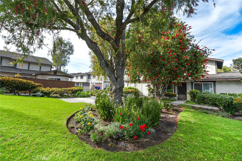 22346 Harbor Ridge Lane, Unit 4 Torrance, CA 90502 - Photo 22 of 34 a view of a garden with a fountain