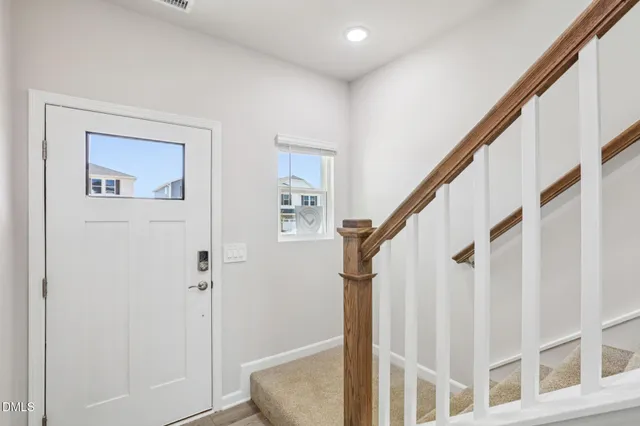 a black and white photo of a living room