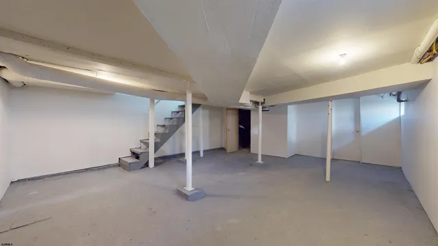 a view of a yard with large trees