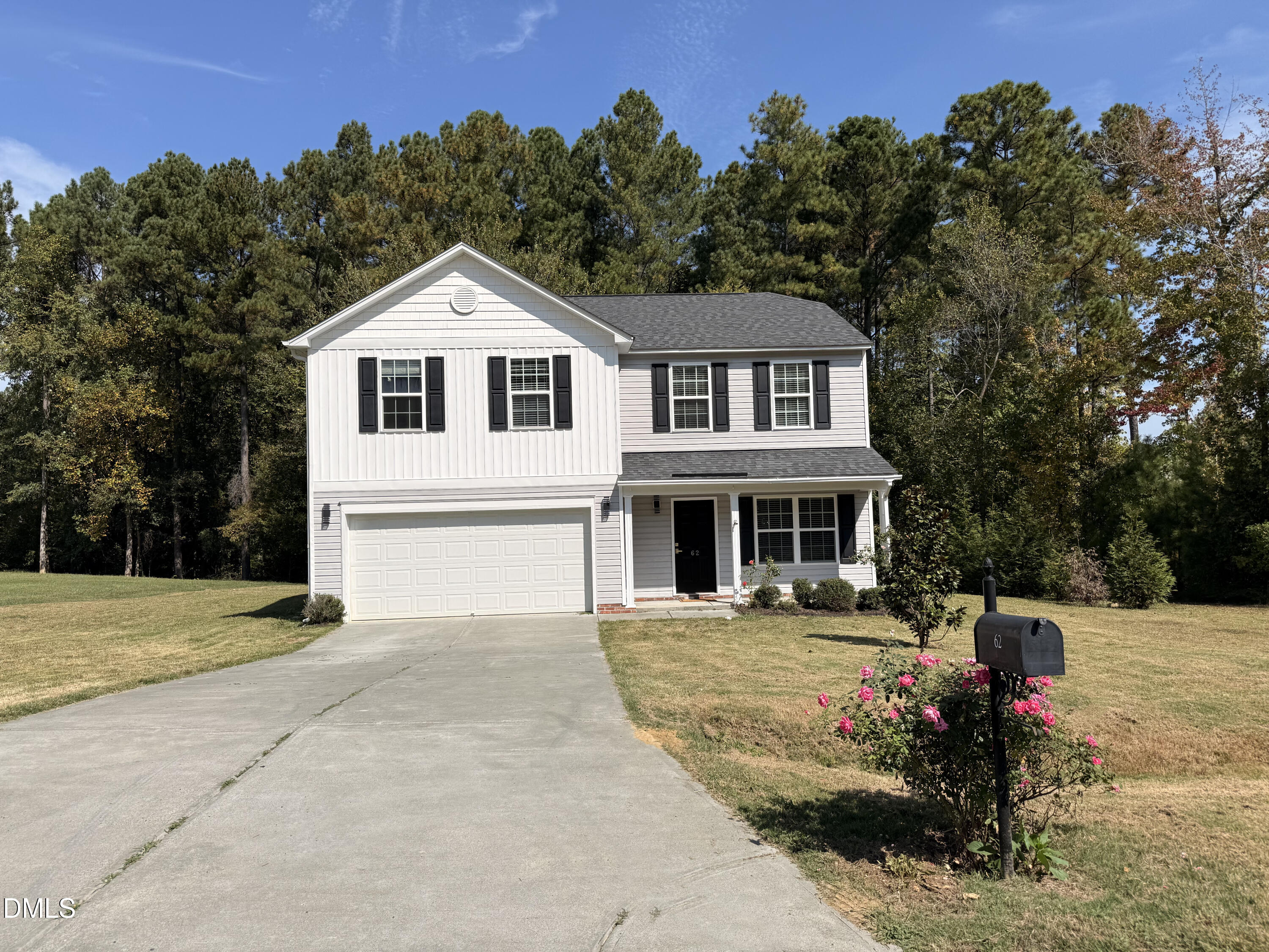 62 West Boulder Road Henderson, NC 27537 - Photo 2 of 34 a front view of a house with a yard