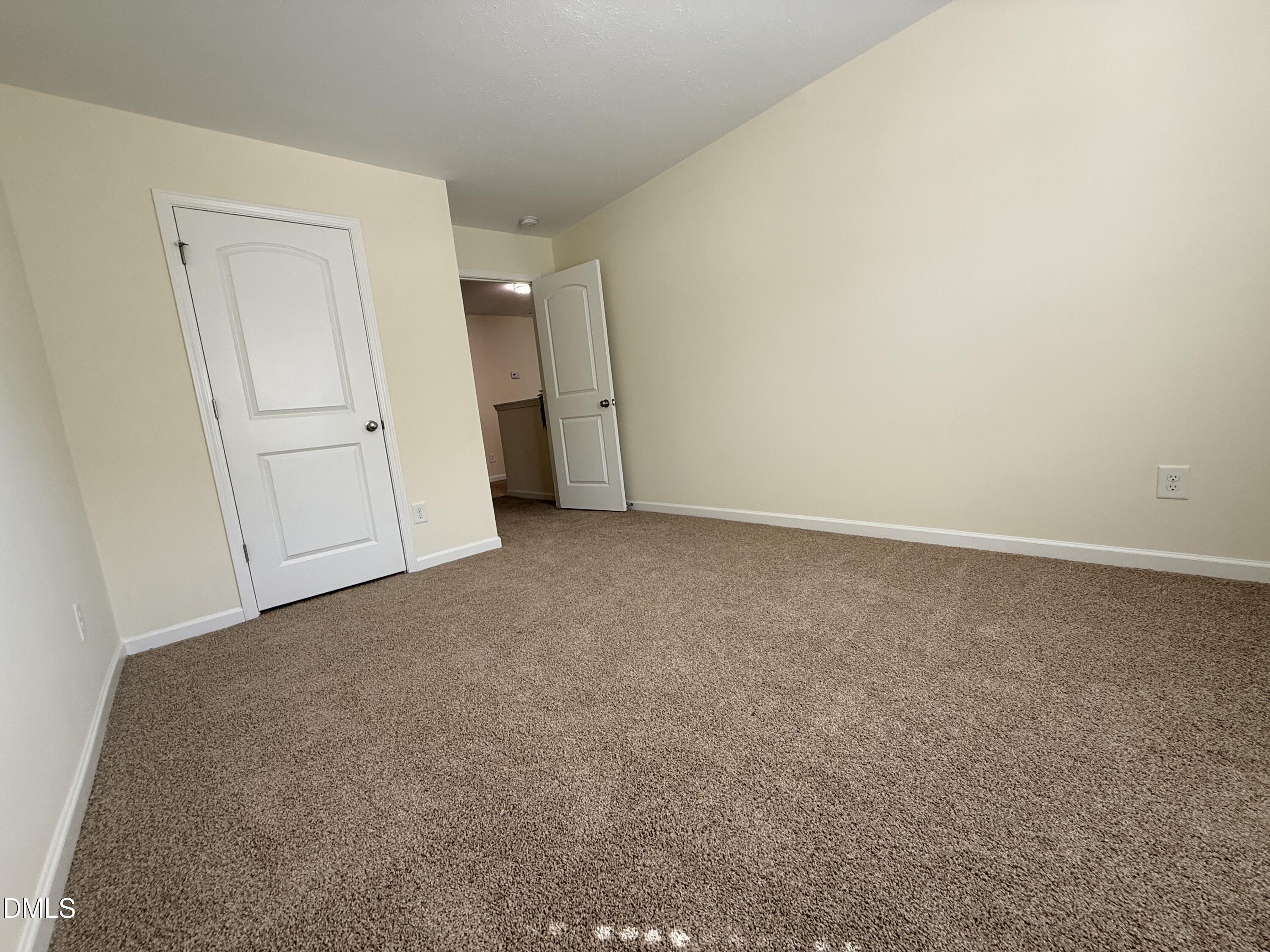 62 West Boulder Road Henderson, NC 27537 - Photo 26 of 34 an empty room with a natural light