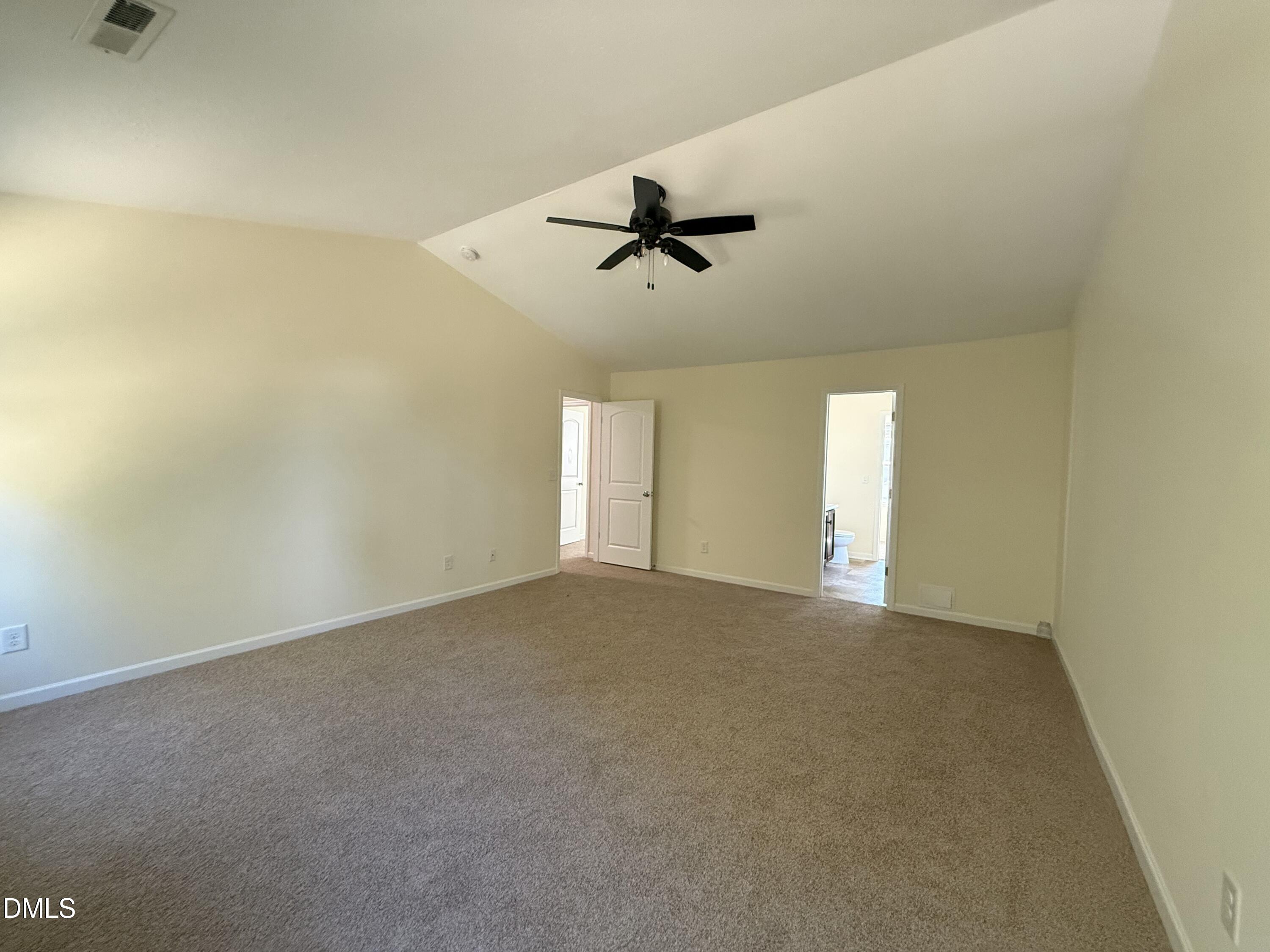 62 West Boulder Road Henderson, NC 27537 - Photo 28 of 34 an empty room with windows and fan