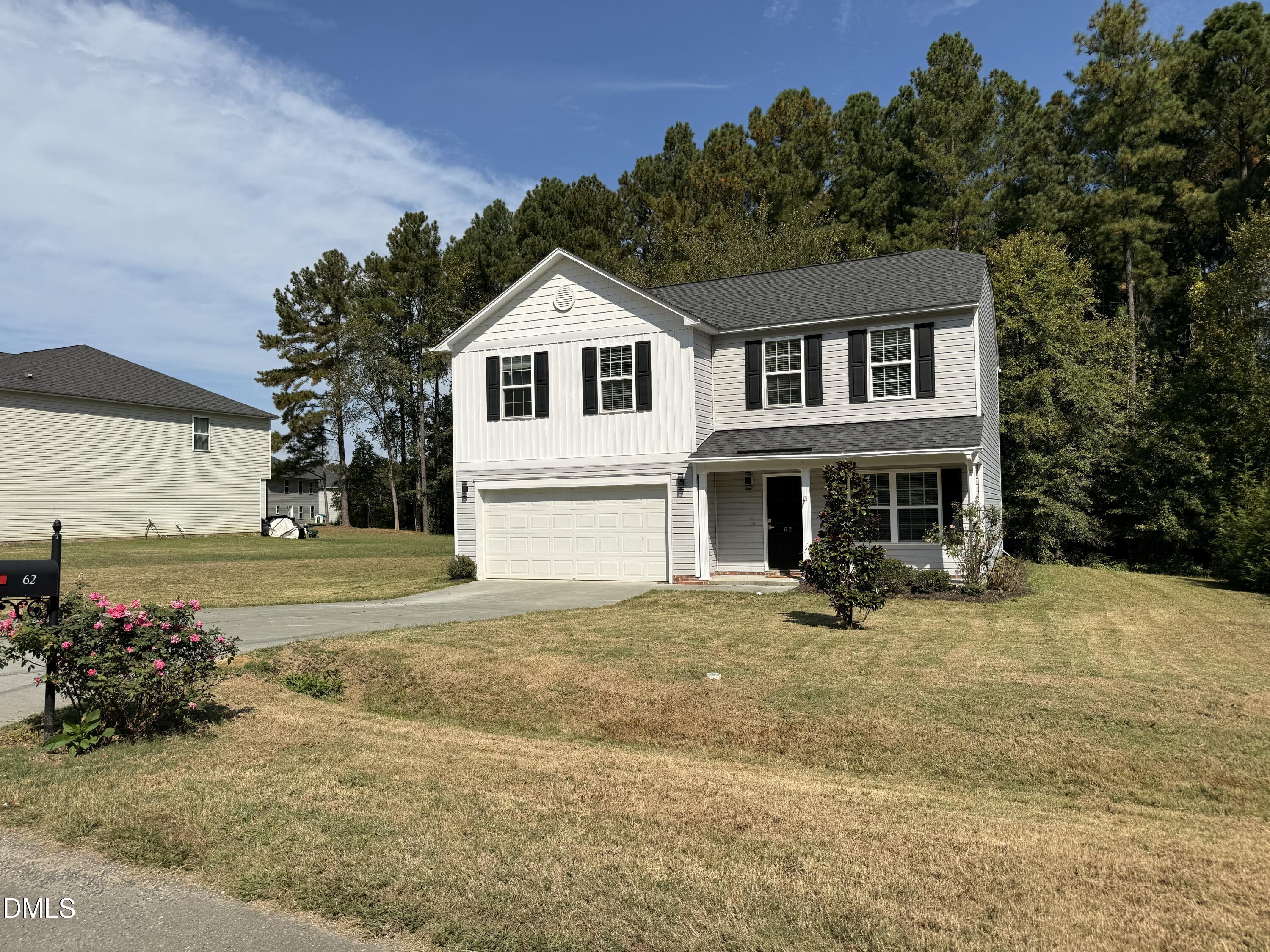 62 West Boulder Road Henderson, NC 27537 - Photo 3 of 34 a front view of a house with a yard