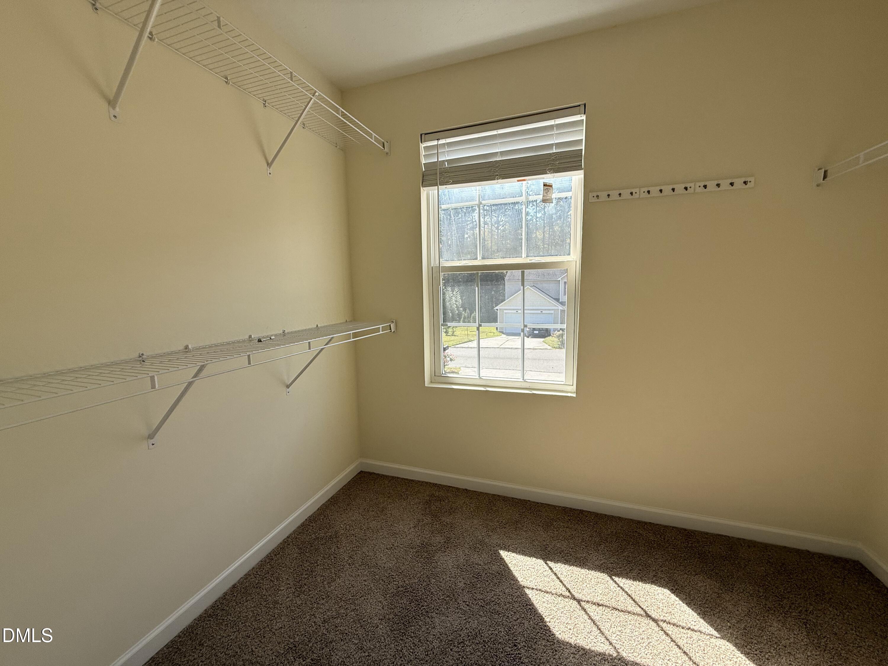 62 West Boulder Road Henderson, NC 27537 - Photo 32 of 34 a view of a small space with racks on the wall