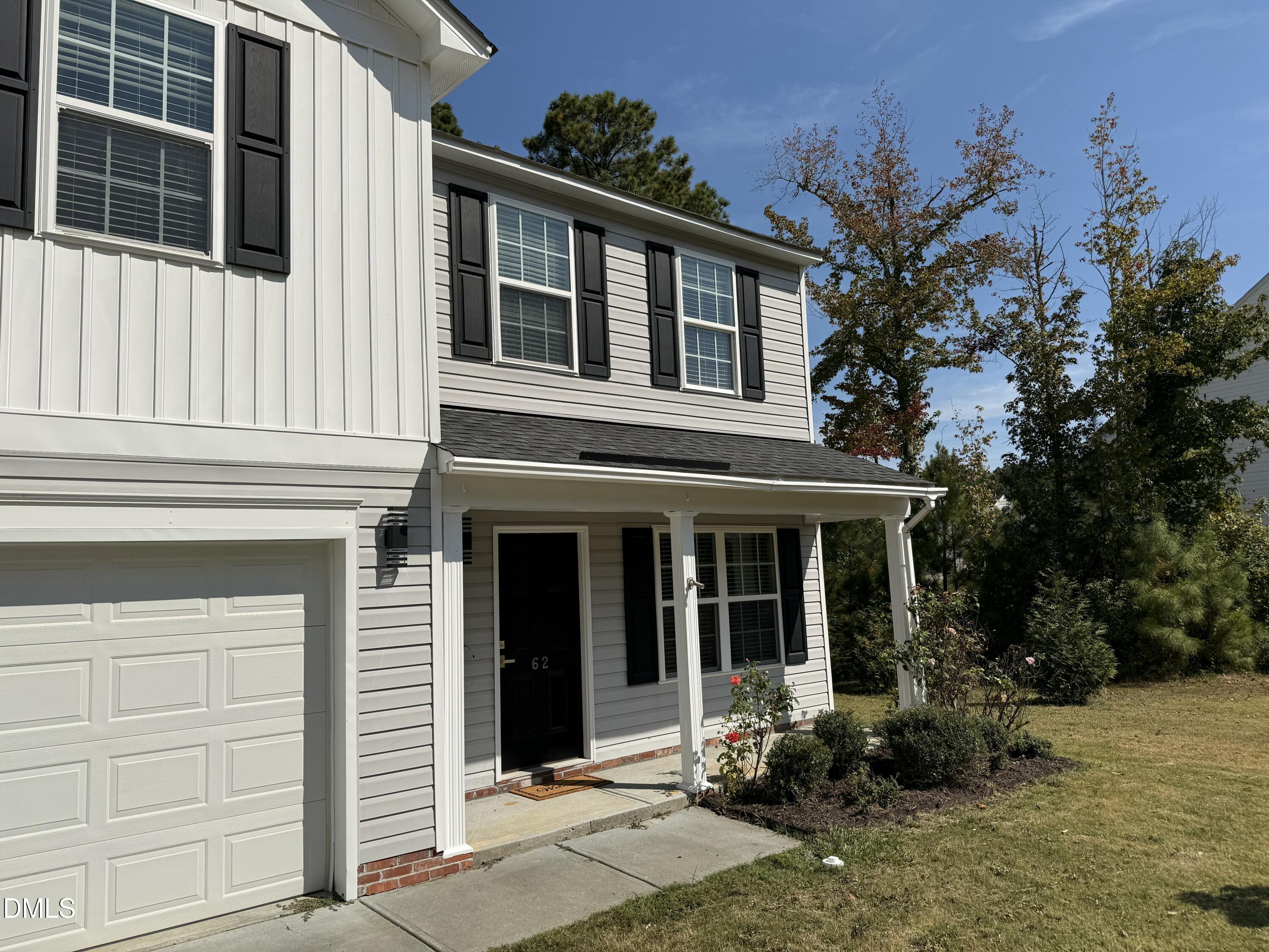 62 West Boulder Road Henderson, NC 27537 - Photo 4 of 34 a front view of a house with a yard