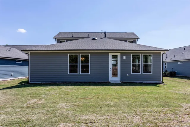 a house view with a garden space