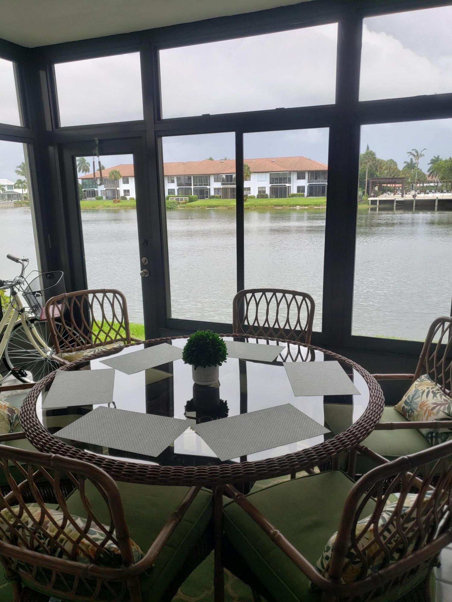 6021 Southeast Landing Way, Unit BLDG 2 #2 Stuart, FL 34997 - Photo 25 of 35 a living room with chairs