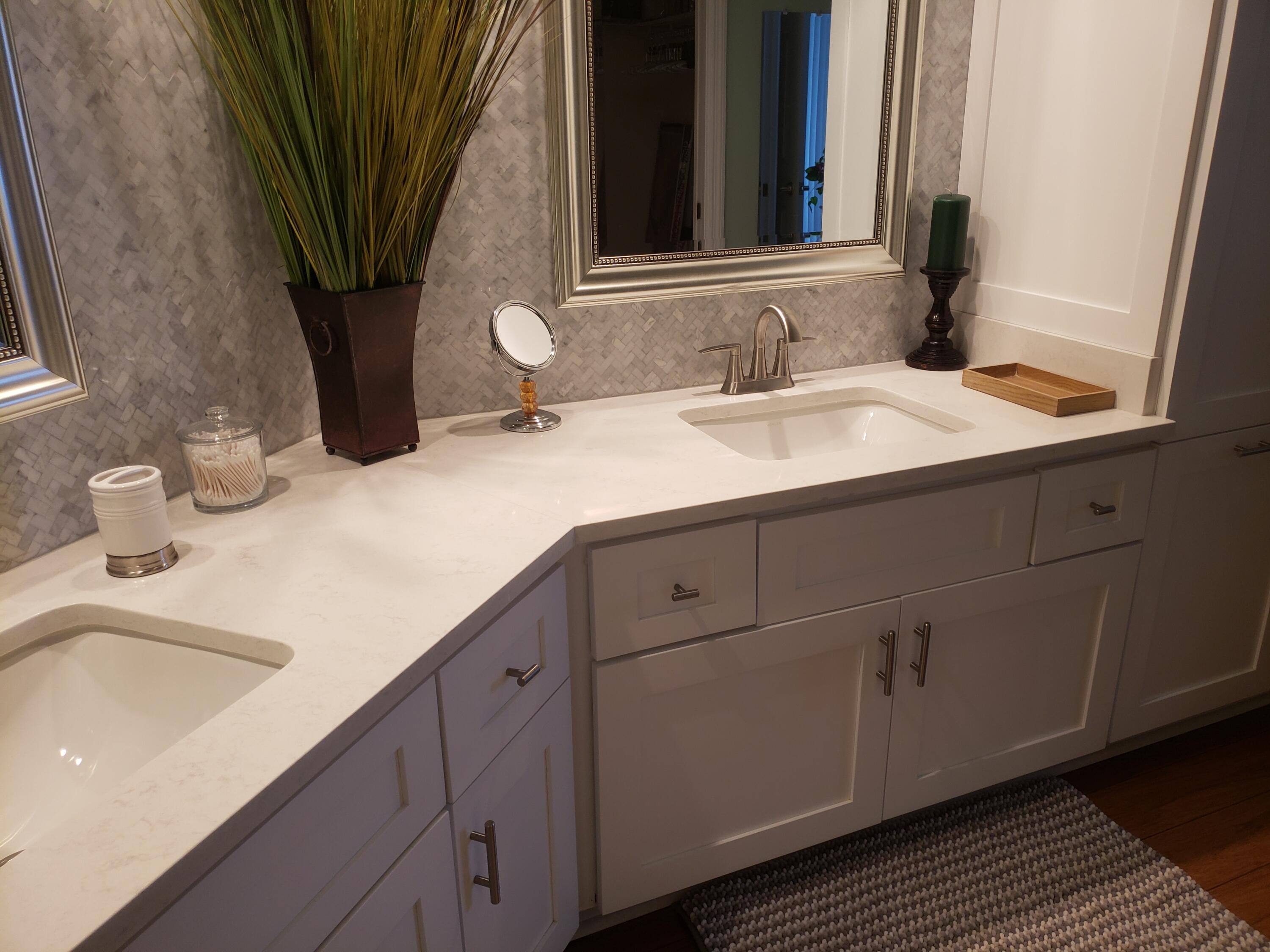 6021 Southeast Landing Way, Unit BLDG 2 #2 Stuart, FL 34997 - Photo 31 of 35 a bathroom with a sink and a mirror