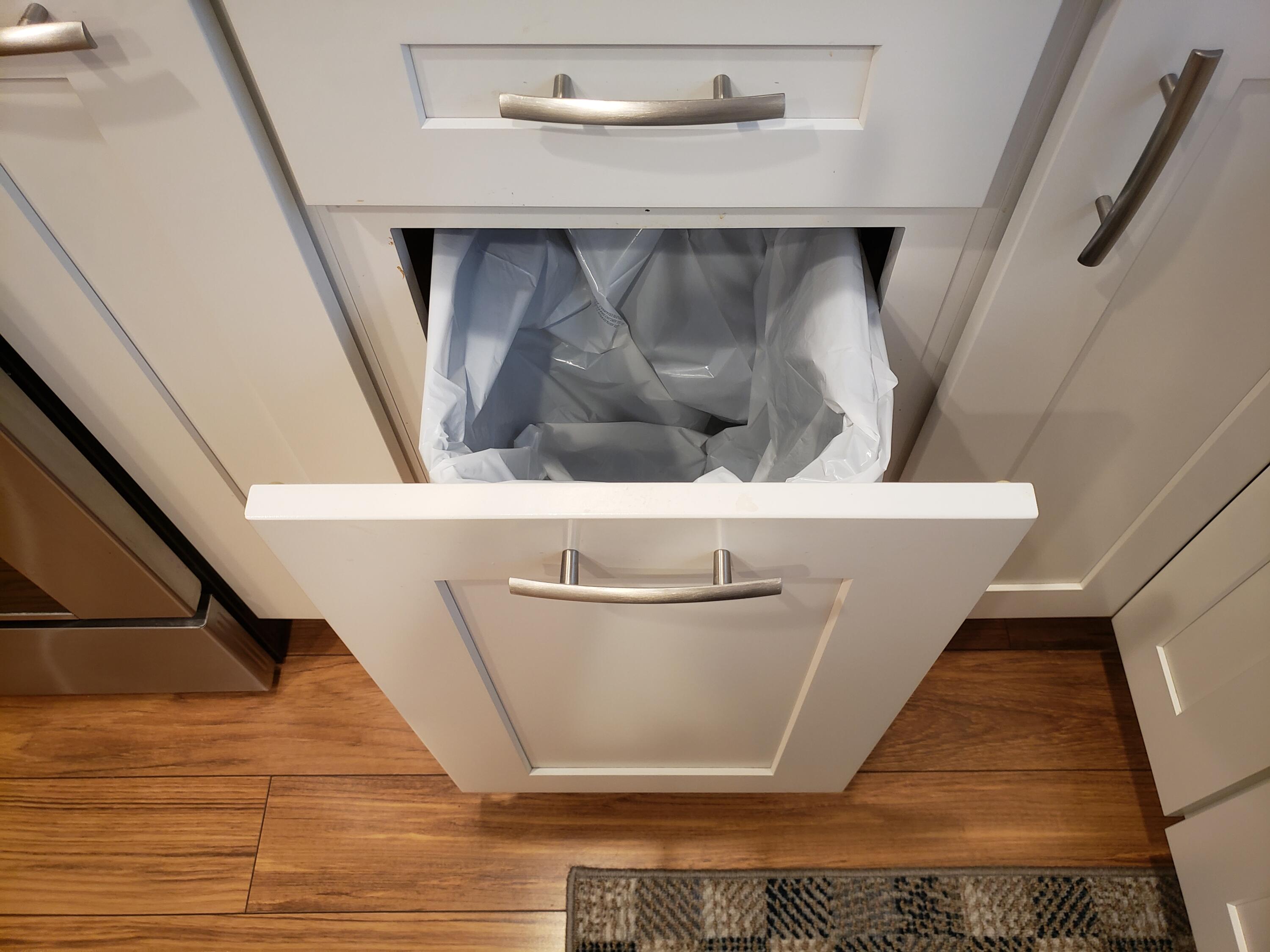 6021 Southeast Landing Way, Unit BLDG 2 #2 Stuart, FL 34997 - Photo 9 of 35 a view of a living room with a sink and wooden floor