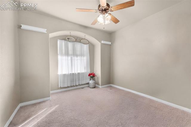 533 Talus Road Monument, CO 80132 - Photo 21 of 46 Carpeted empty room featuring ceiling fan
