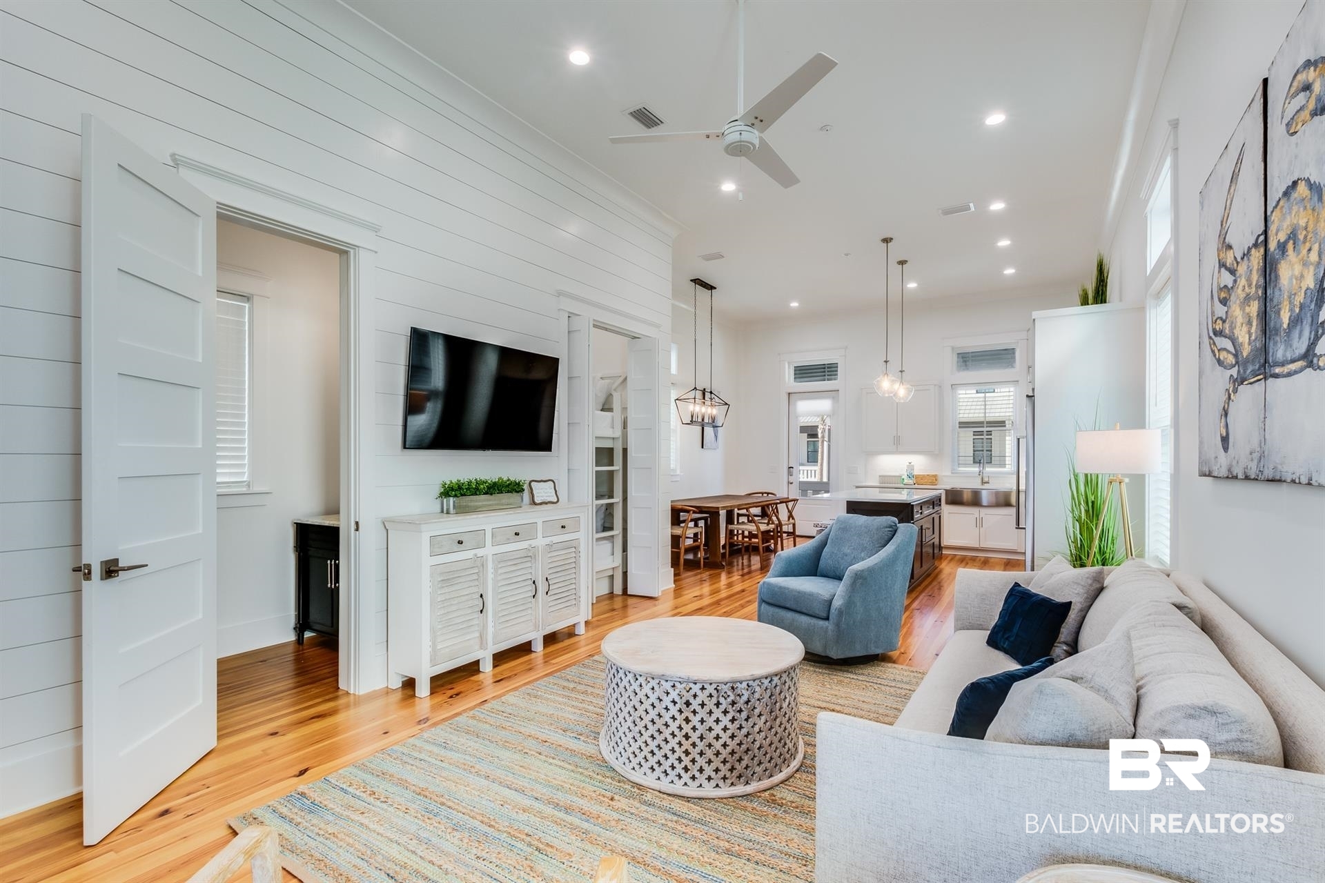 2494 Saltgrass Way Orange Beach, AL 36561 - Photo 9 of 37 Living room featuring light hardwood / wood-style floors and ceiling fan