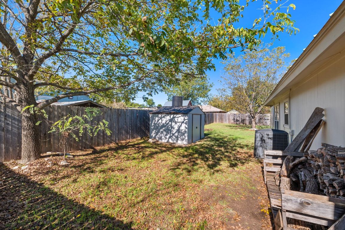 605 Apache Trail Leander, TX 78641 - Photo 27 of 27 a view of a yard with wooden fence
