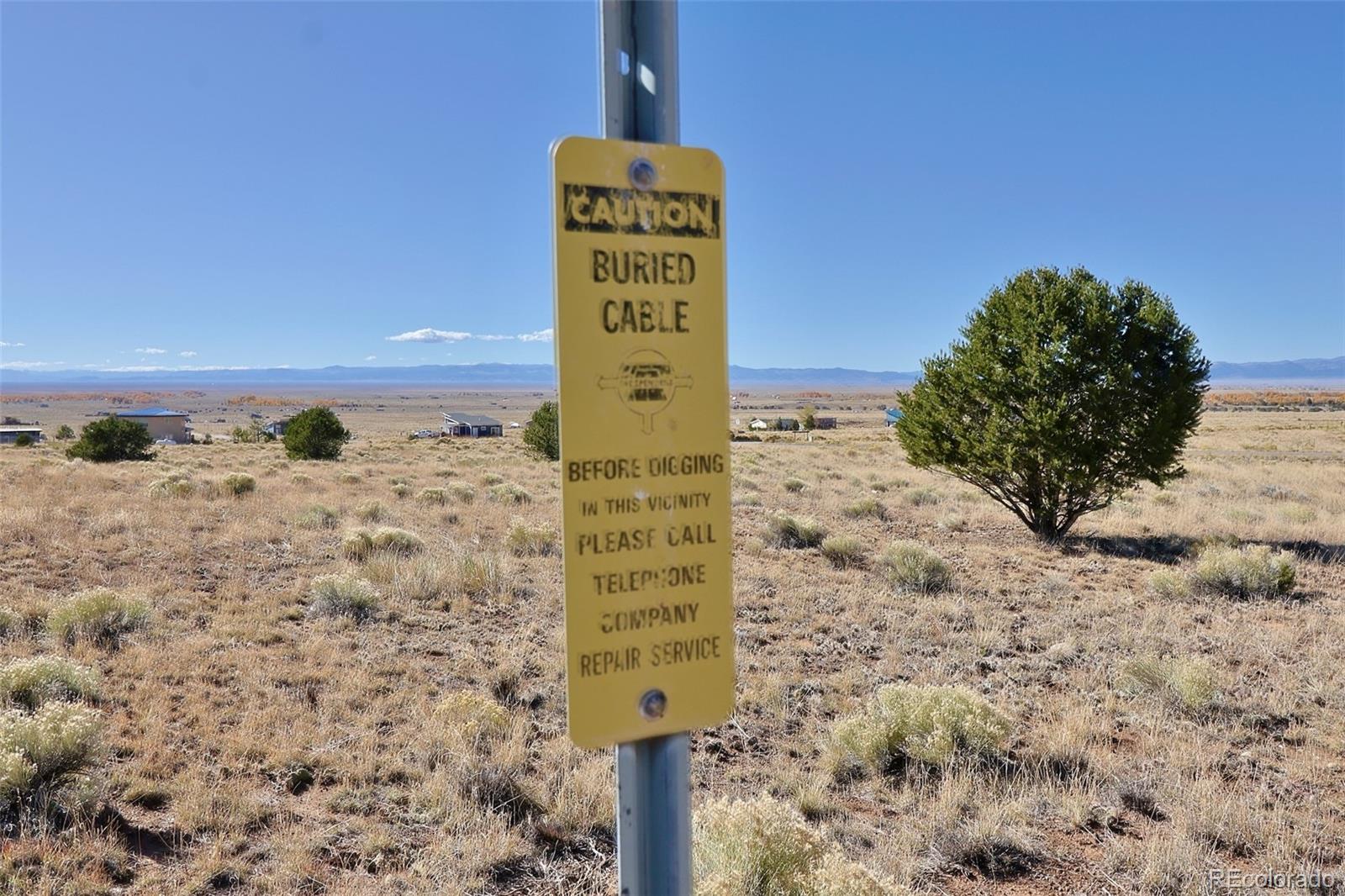 3402 Camino Del Rey Crestone, CO 81131 - Photo 13 of 14 a sign board with a building in the background