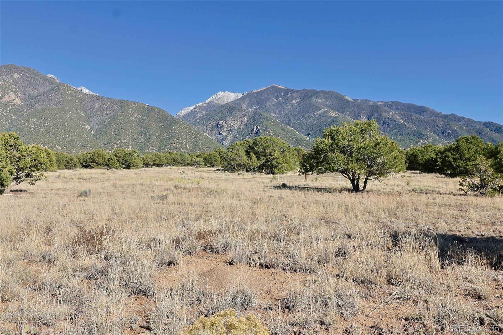3402 Camino Del Rey Crestone, CO 81131 - Photo 2 of 14 a view of a dry field with mountains in the background