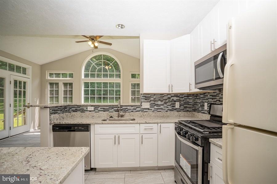 7769 Rotherham Drive Hanover, MD 21076 - Photo 11 of 22 Kitchen with tile back splash
