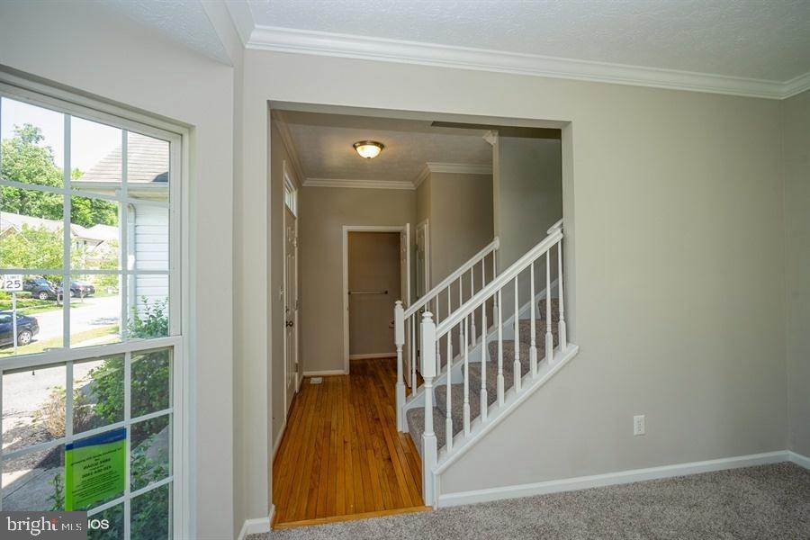 7769 Rotherham Drive Hanover, MD 21076 - Photo 4 of 22 Foyer with hardwood floors