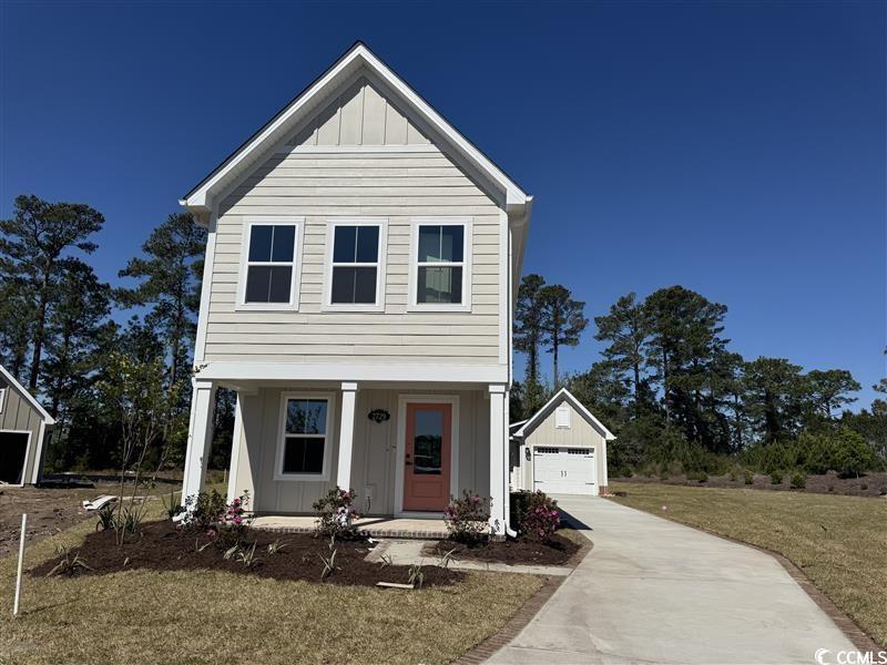 2729 Rowyn Street Longs, SC 29568 - Photo 1 of 1 View of front facade featuring board and batten si