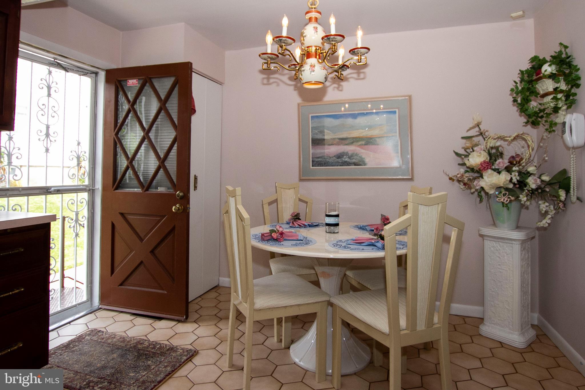 1511 Customs Road Rosedale, MD 21237 - Photo 11 of 38 SIDE ENTRANCE TO KITCHEN SHOWING EATING AREA!!~