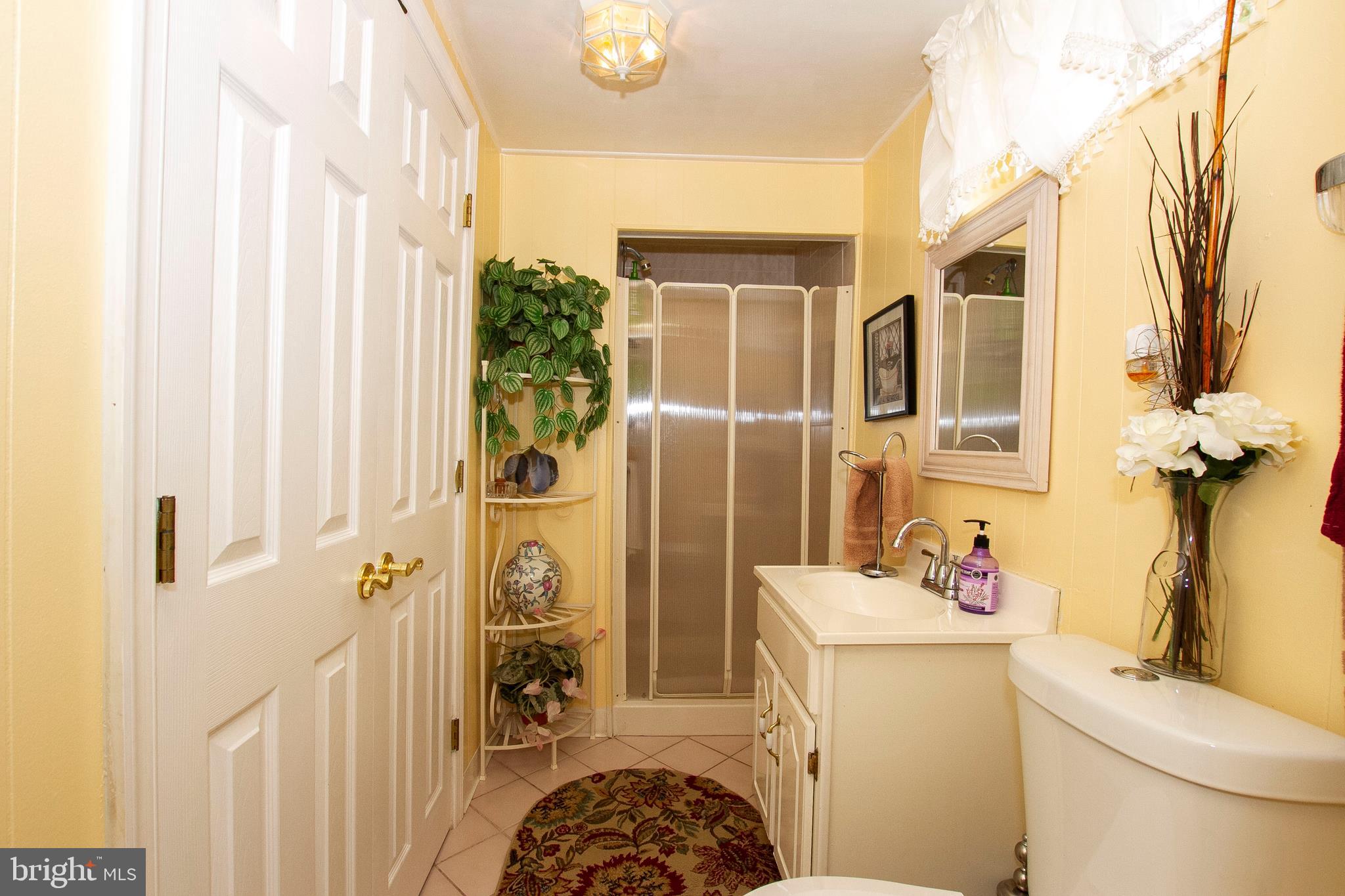 1511 Customs Road Rosedale, MD 21237 - Photo 34 of 38 LOWERL LEVEL BATHROOM WITH LARGE CLOSET!!