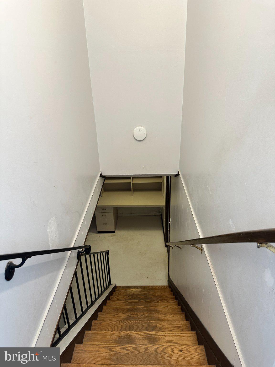 8336 Scotts Level Road Baltimore, MD 21208 - Photo 38 of 55 Inviting descent to hidden spaces.